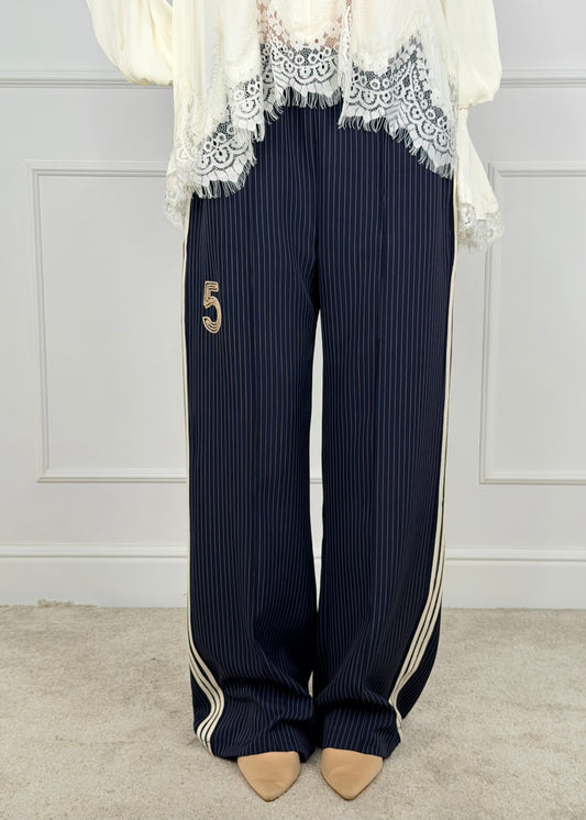 PE260080 - TENSIONE IN PANTALONE GESSATO PANNA