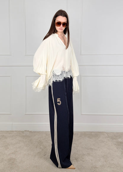 PE260080 - TENSIONE IN PANTALONE GESSATO PANNA